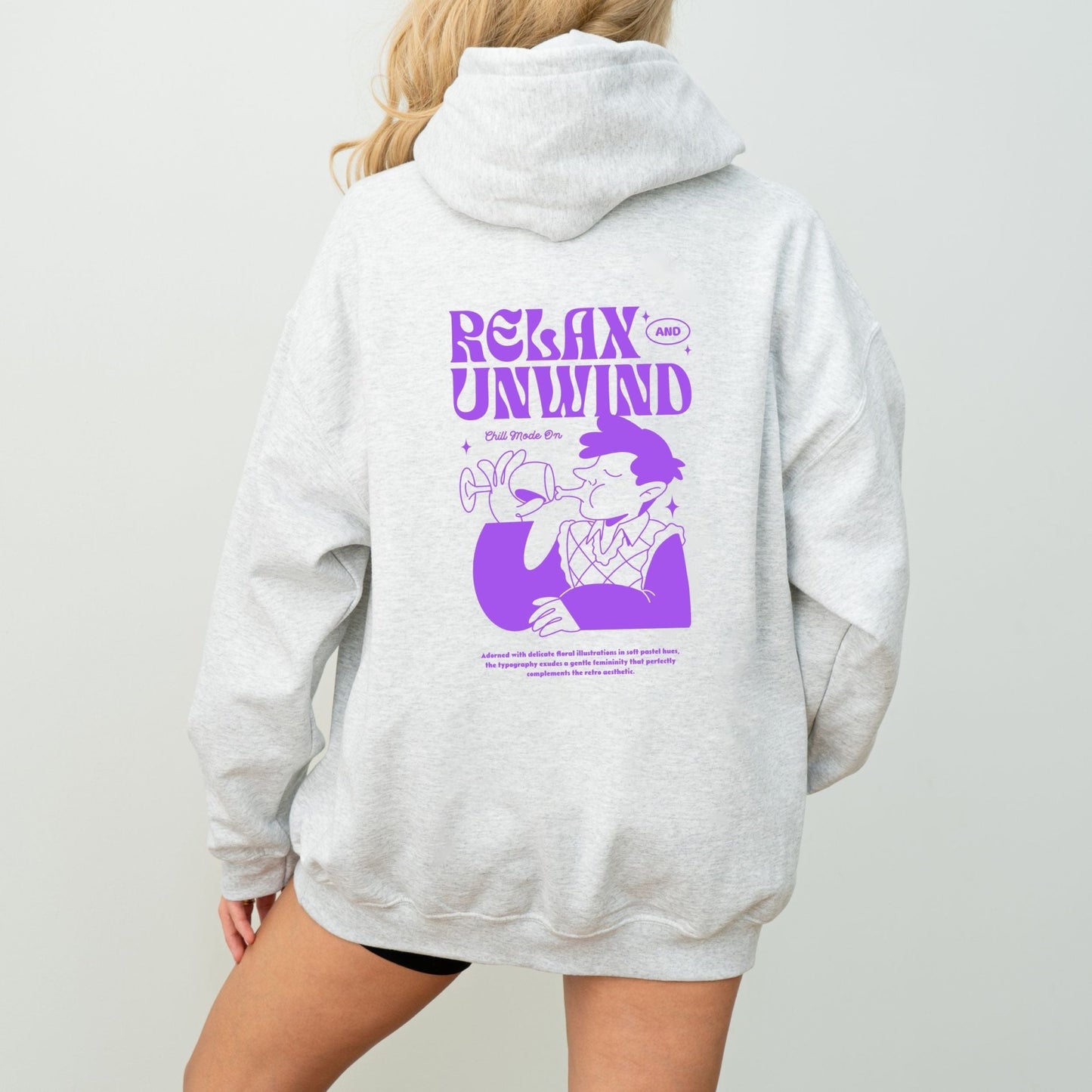 Retro Relax and Unwind hoodie with pastel graphic design, perfect cozy chill-day apparel.