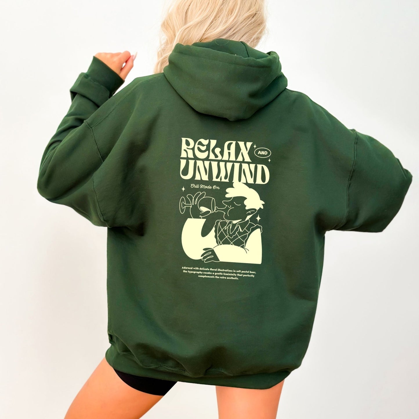 Retro Relax and Unwind hoodie with pastel graphic design, perfect cozy chill-day apparel.