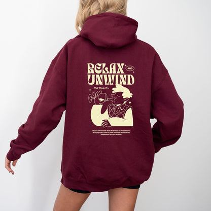 Retro Relax and Unwind hoodie with pastel graphic design, perfect cozy chill-day apparel.