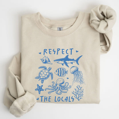 Respect the Locals sweatshirt with sea creatures in blue line art for ocean lovers