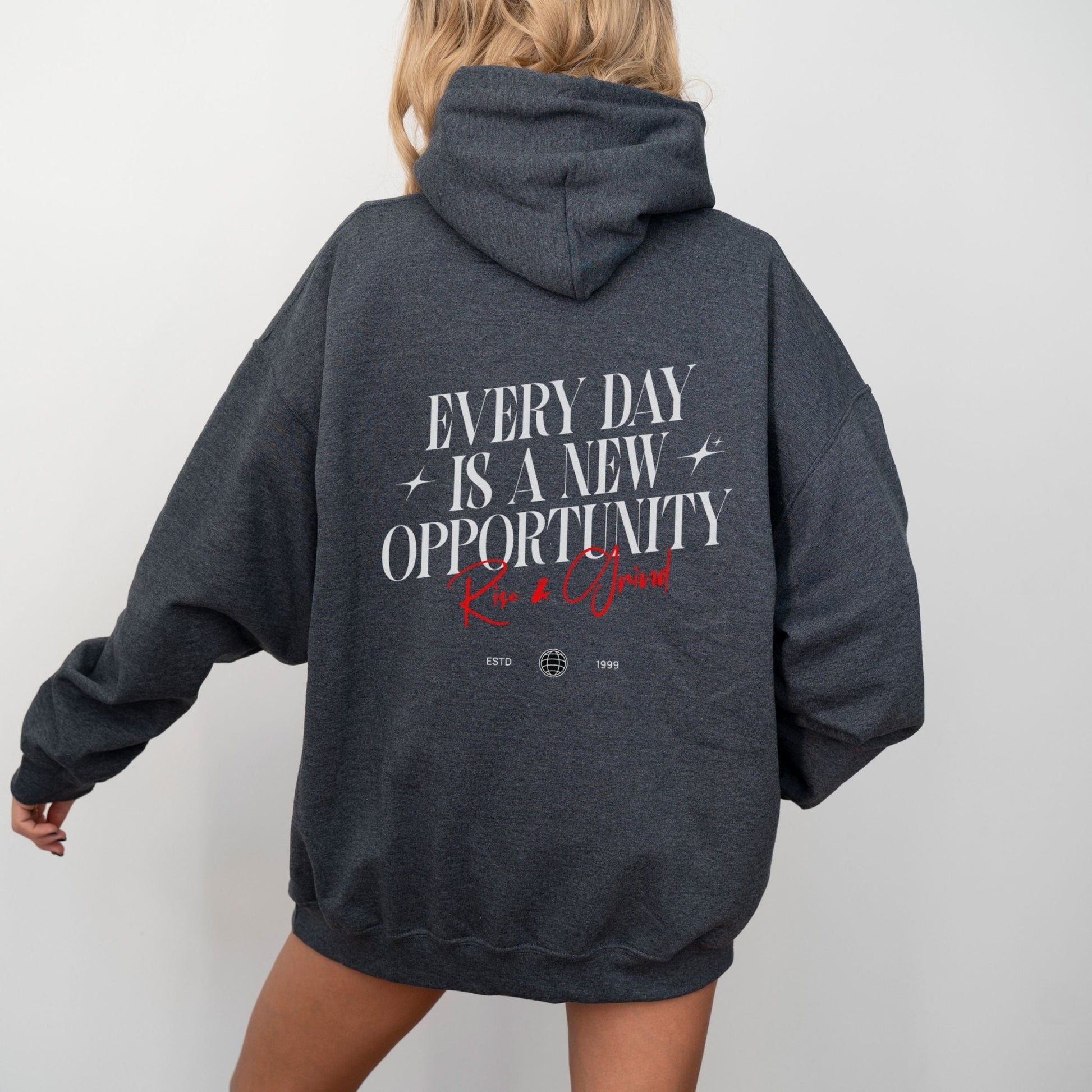 Rise & Grind motivational hoodie with minimalist typography design for daily inspiration.