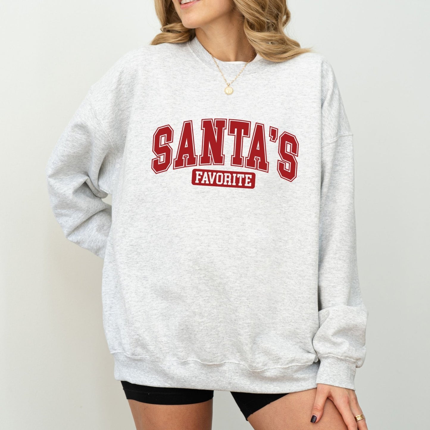 Santa's Favorite holiday sweatshirt with festive graphic design, perfect for Christmas and winter wardrobe.