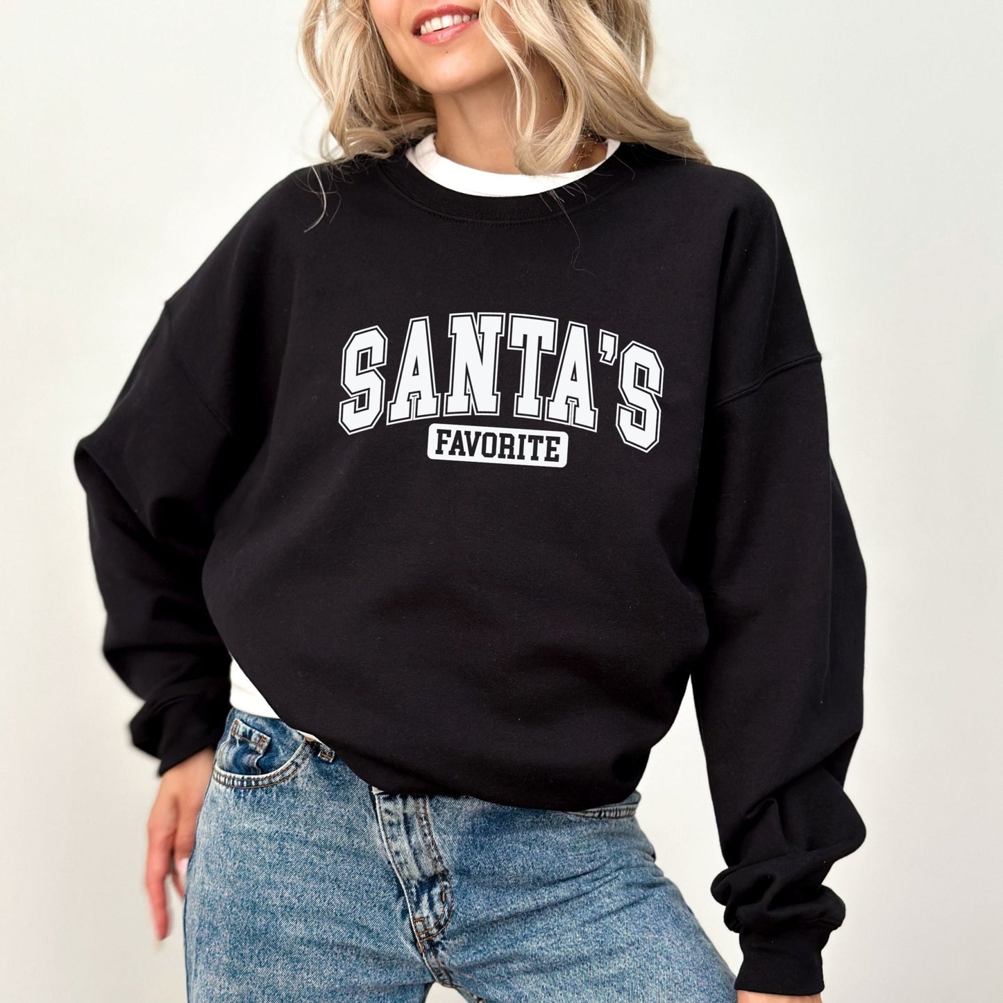 Santa's Favorite holiday sweatshirt with festive graphic design, perfect for Christmas and winter wardrobe.