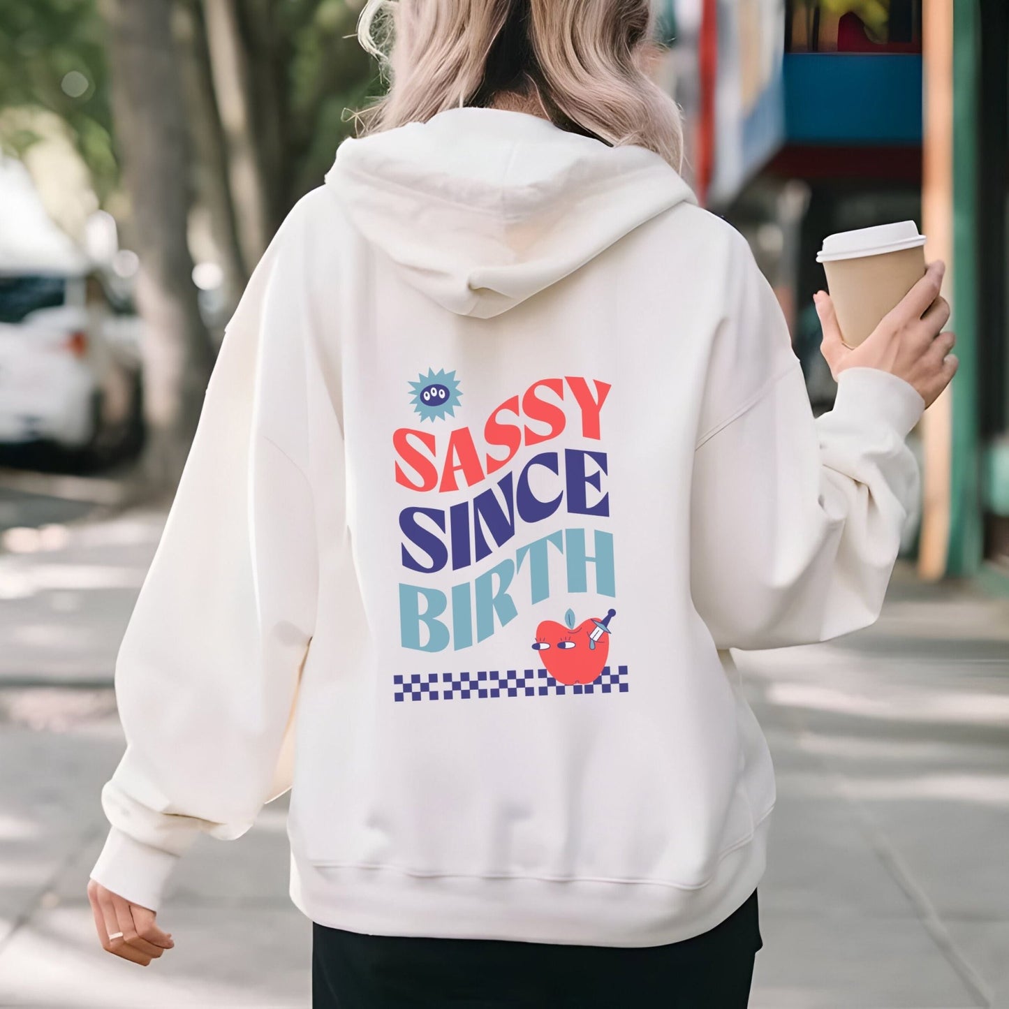 Sassy Since Birth hoodie with bold typography and colorful graphic design, cozy and available in 6 colors.