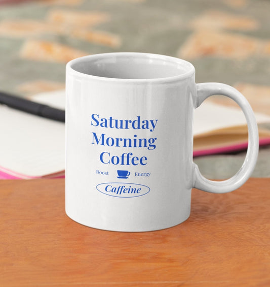 Minimalist Saturday morning coffee mug for caffeine lovers, available in 11 oz and 15 oz ceramic sizes.