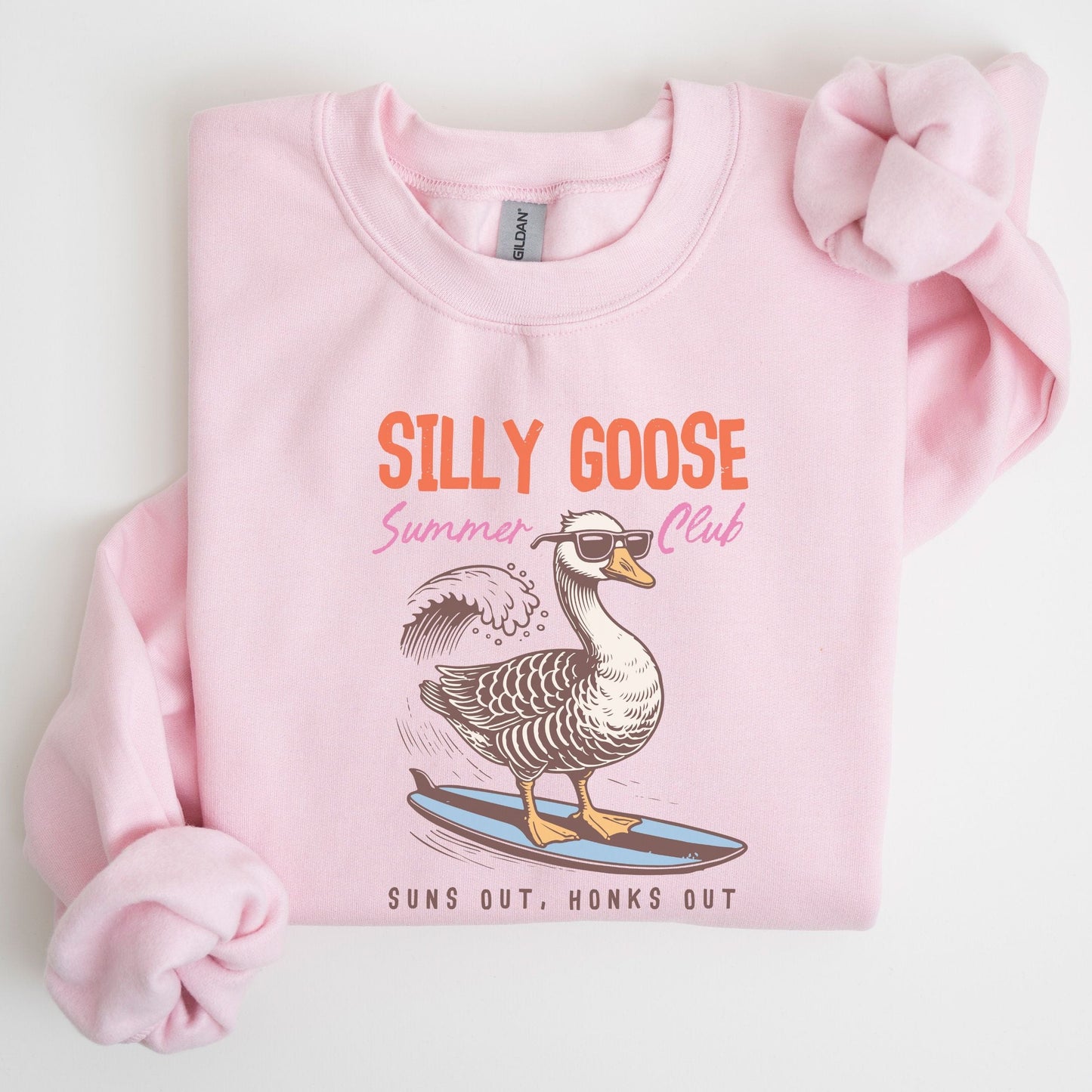 Silly Goose summer sweatshirt with surfing goose graphic and retro beach theme