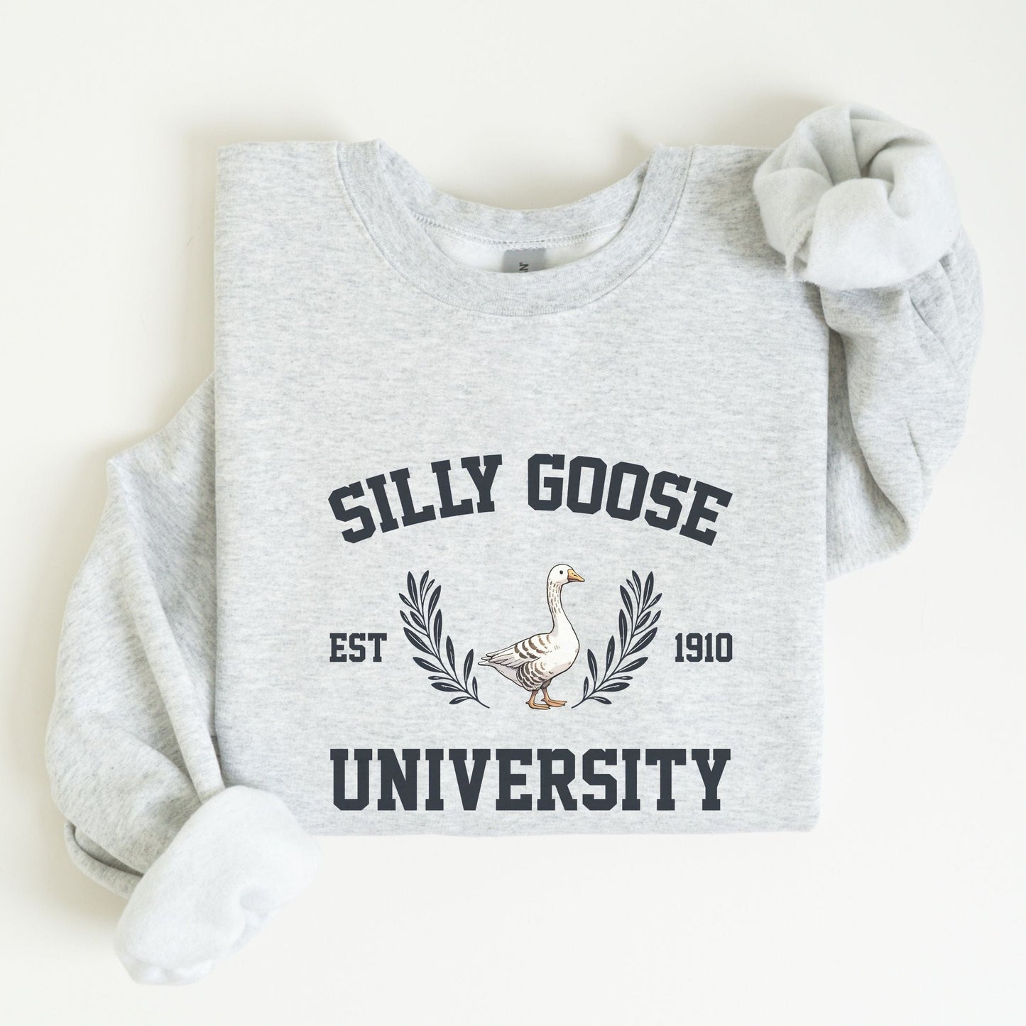 “Silly Goose University” sweatshirt with vintage collegiate lettering and a goose crest — perfect for cozy, funny fall style.