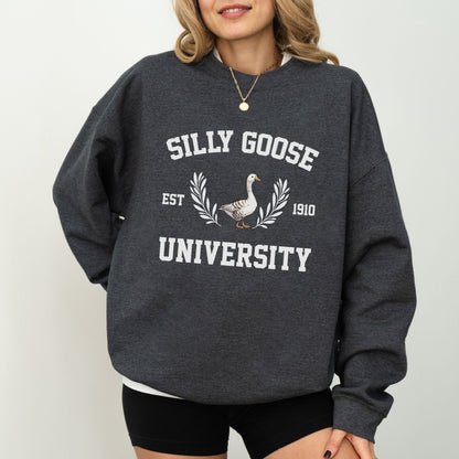 "Silly Goose University" funny graphic sweatshirt, 50% cotton, 50% polyester, available in 9 colors.