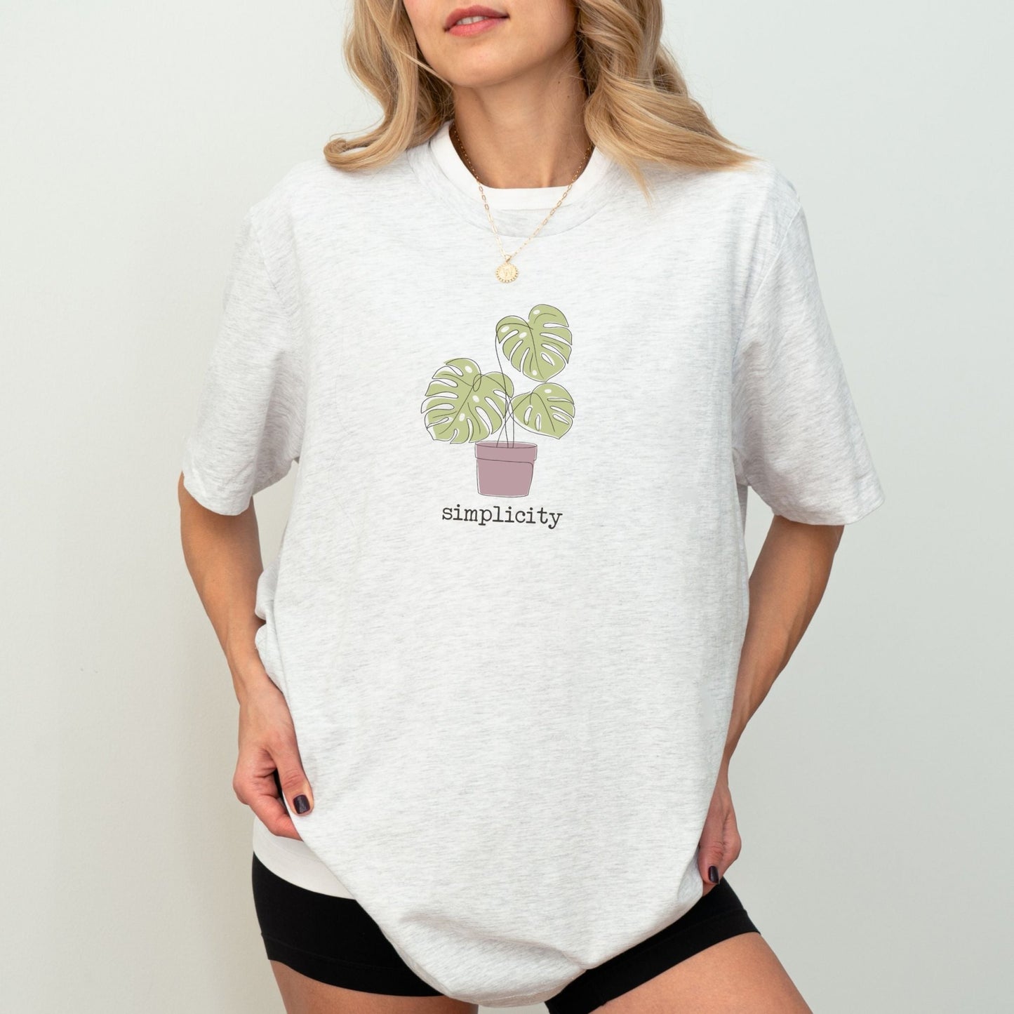 Monstera plant shirt with minimalist design, perfect for plant lovers and cozy vibes.