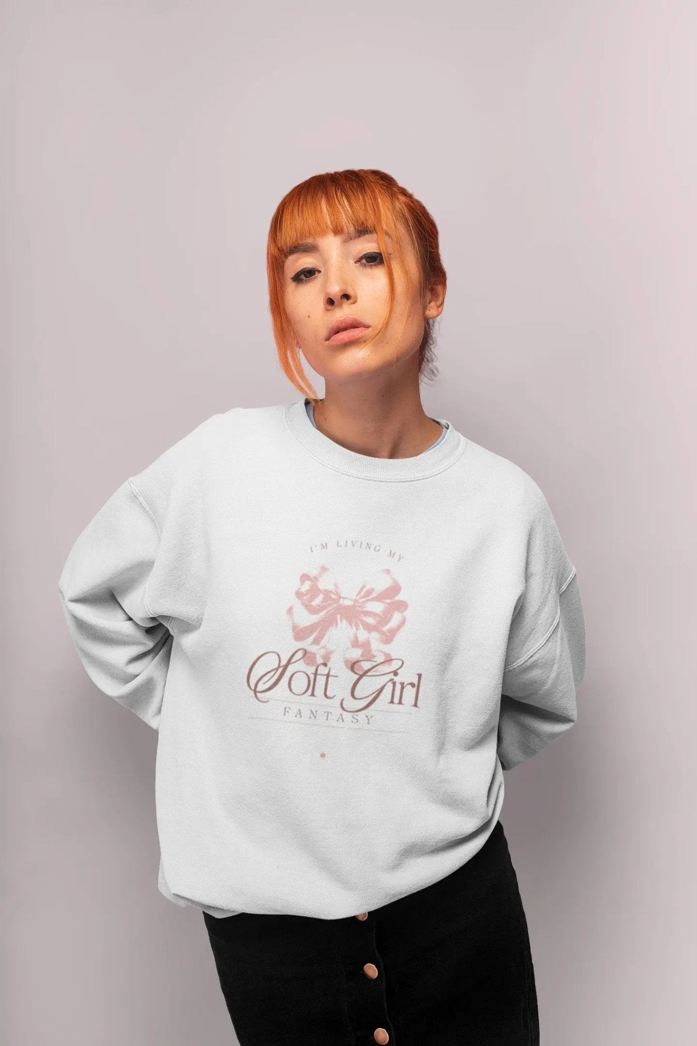 White sweatshirt with Soft Girl Fantasy design and pink bow for coquette style fashion.