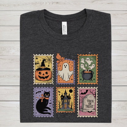Vintage Halloween t-shirt with postage stamp illustrations of ghosts, pumpkins, black cat, haunted house, and trick-or-treat