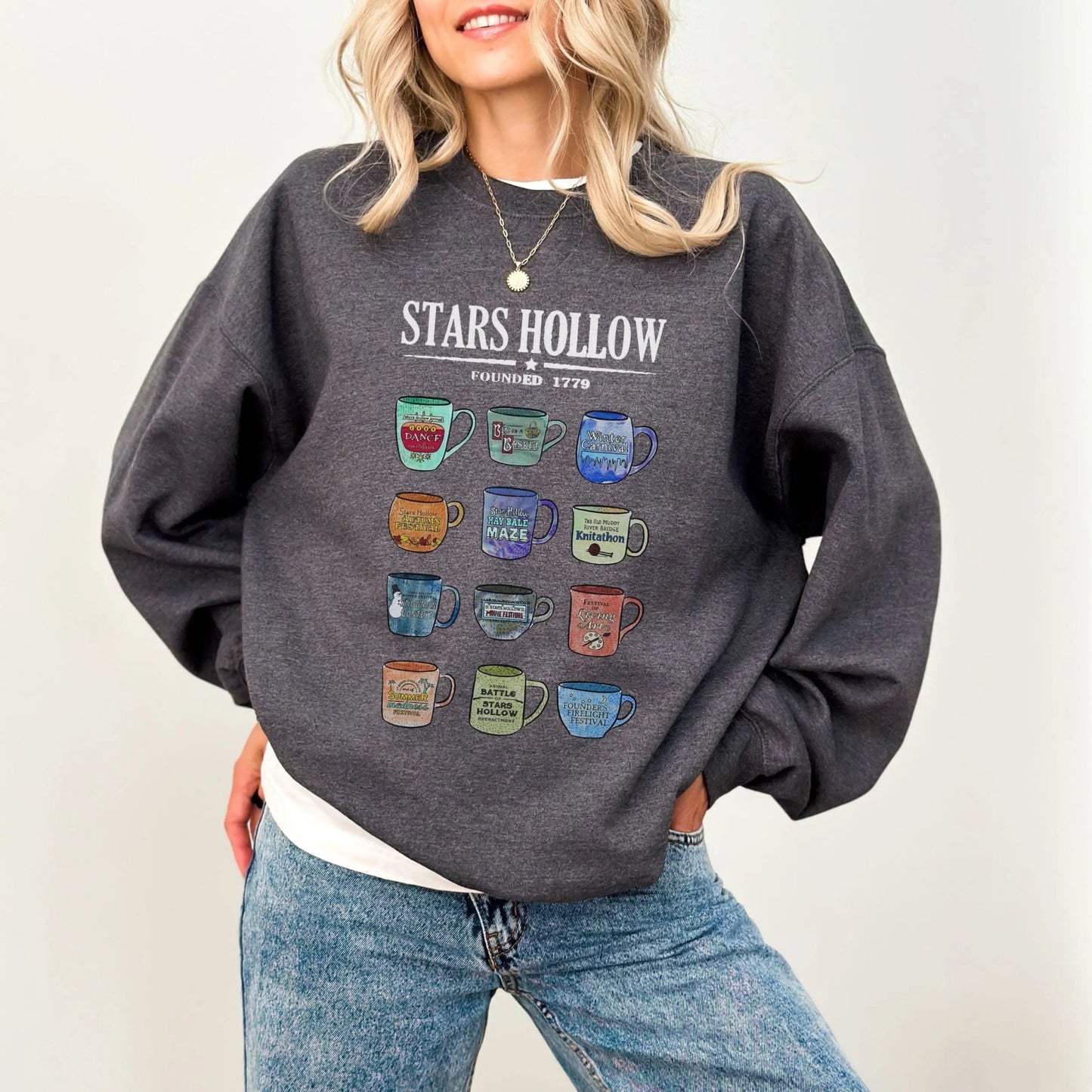 "Stars Hollow Mugs" sweatshirt, cozy town aesthetic, Gilmore Girls merch, 9 colors.