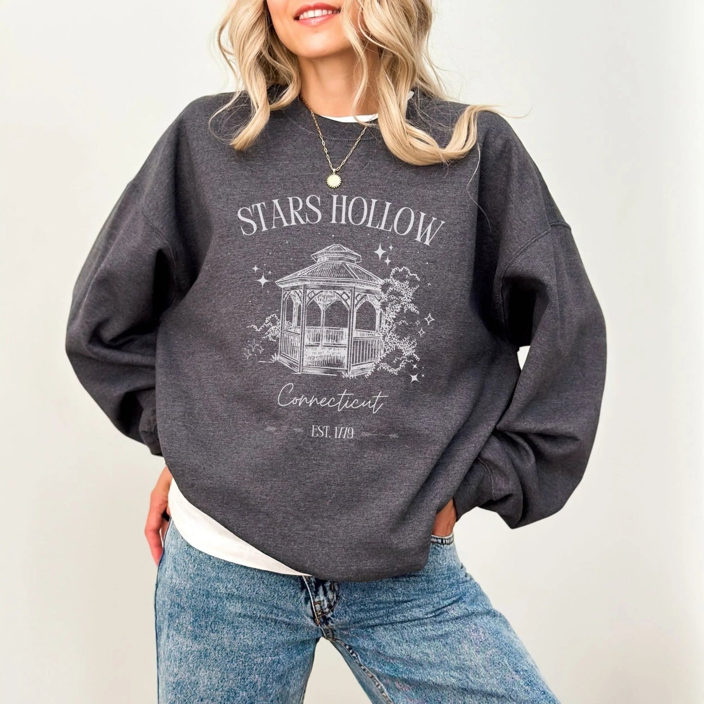 "Stars Hollow" sweatshirt, cozy town aesthetic, Gilmore Girls merch, warm and stylish.