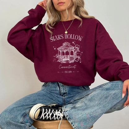 "Stars Hollow" sweatshirt, cozy town aesthetic, Gilmore Girls merch, warm and stylish.