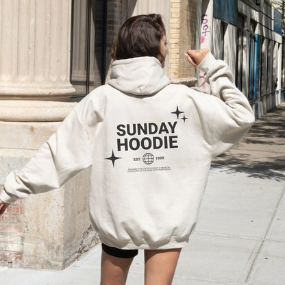 "Sunday Hoodie" from That Cozy Vibe, available in 10 colors, perfect for streetwear fans.