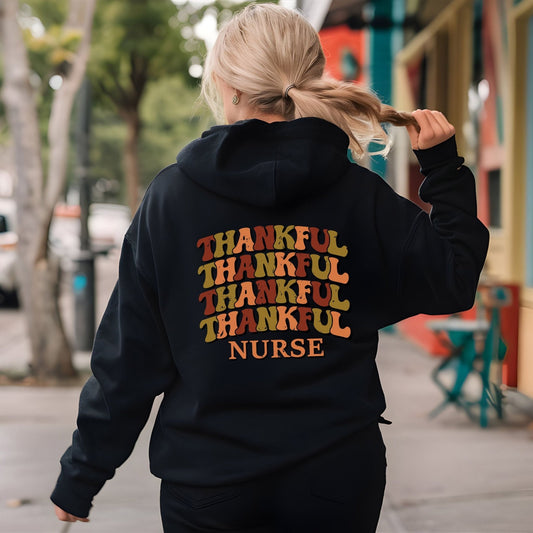 Thankful nurse hoodie with retro fall colors, perfect for Thanksgiving and healthcare workers.