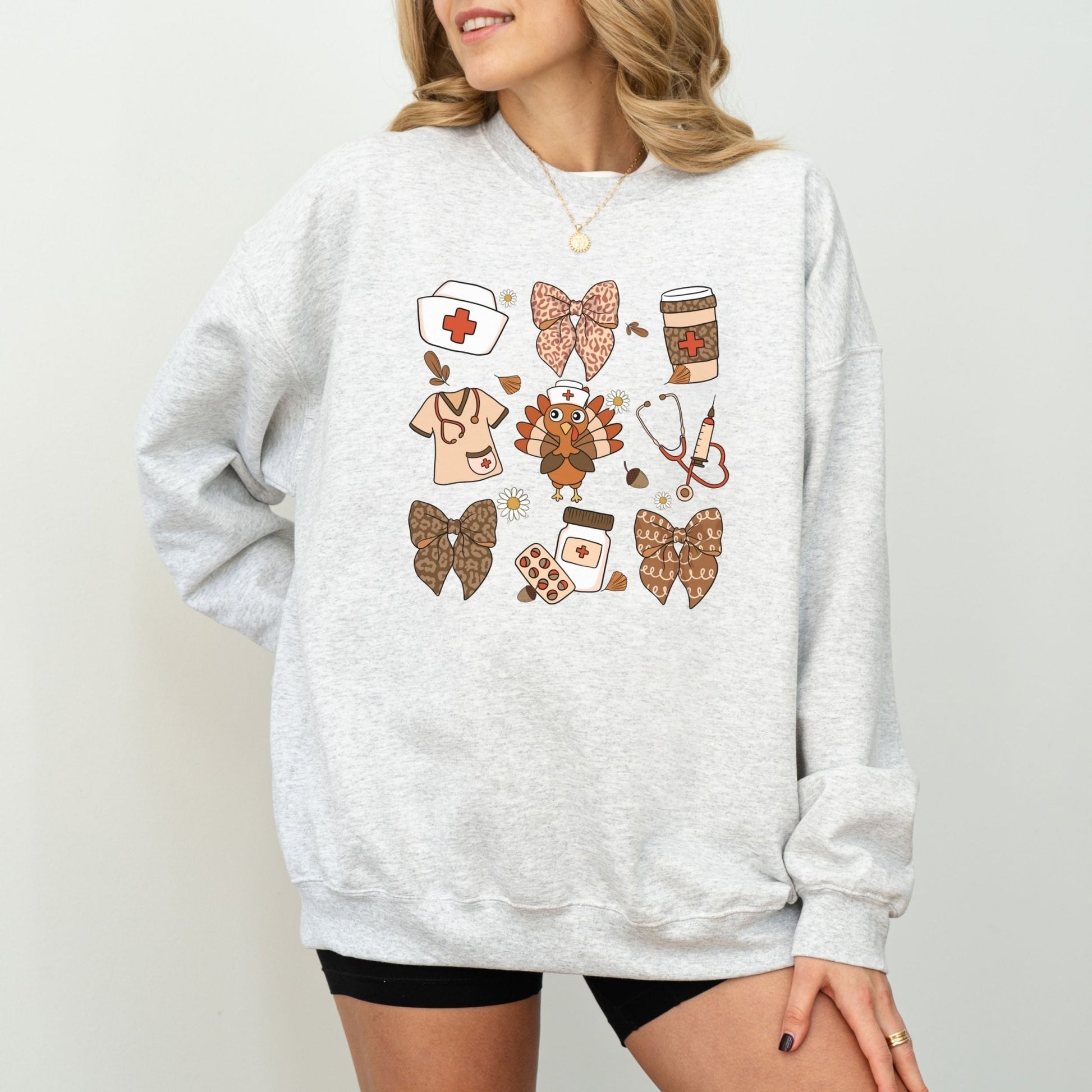 Thanksgiving nurse sweatshirt with healthcare-themed design and festive details.