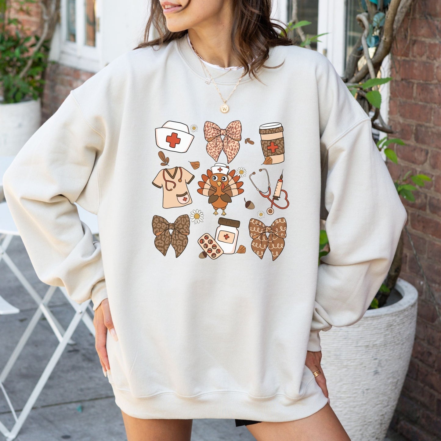 Thanksgiving nurse sweatshirt with healthcare-themed design and festive details.