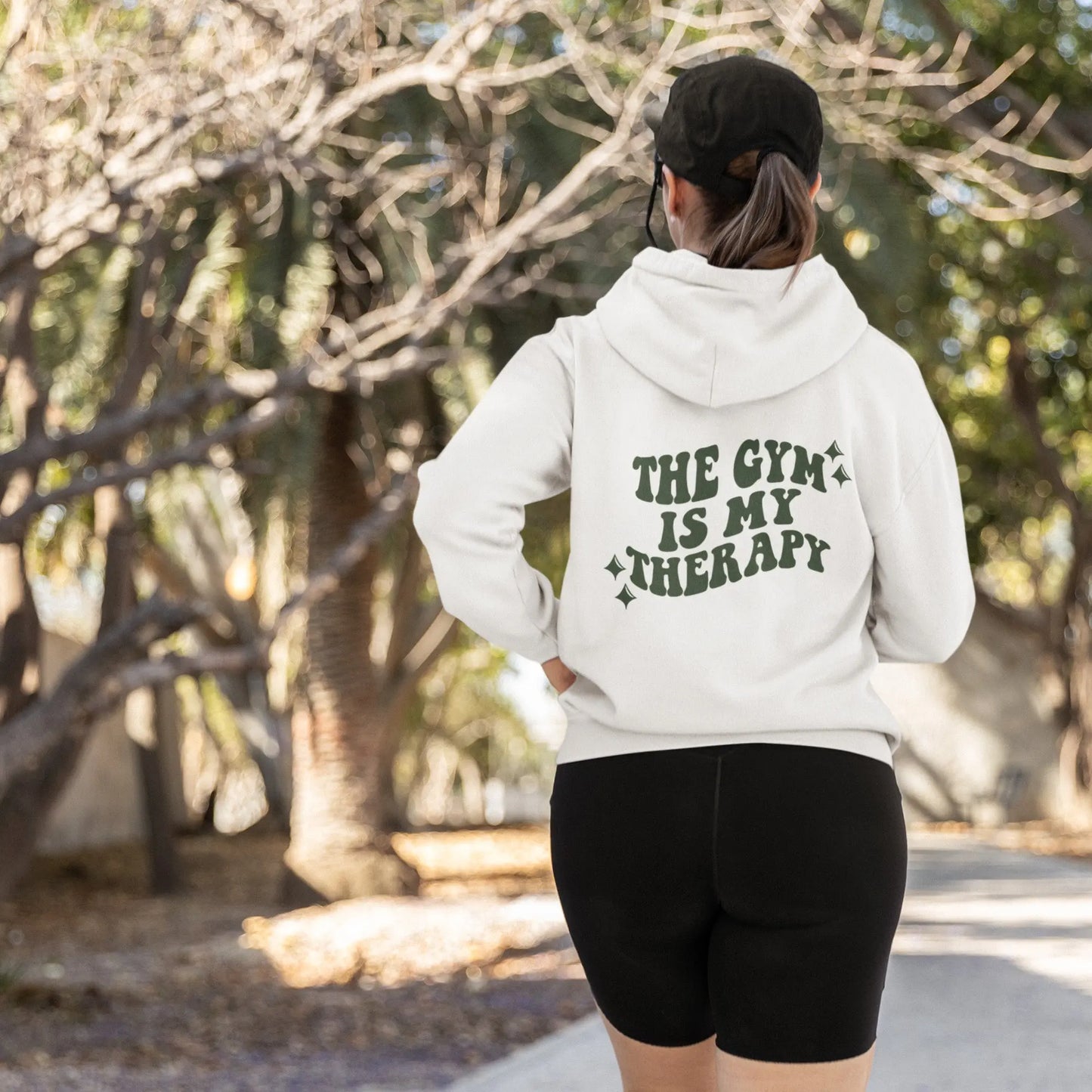 "The Gym is My Therapy" hoodie from That Cozy Vibe, available in 10 colors, fitness motivation.