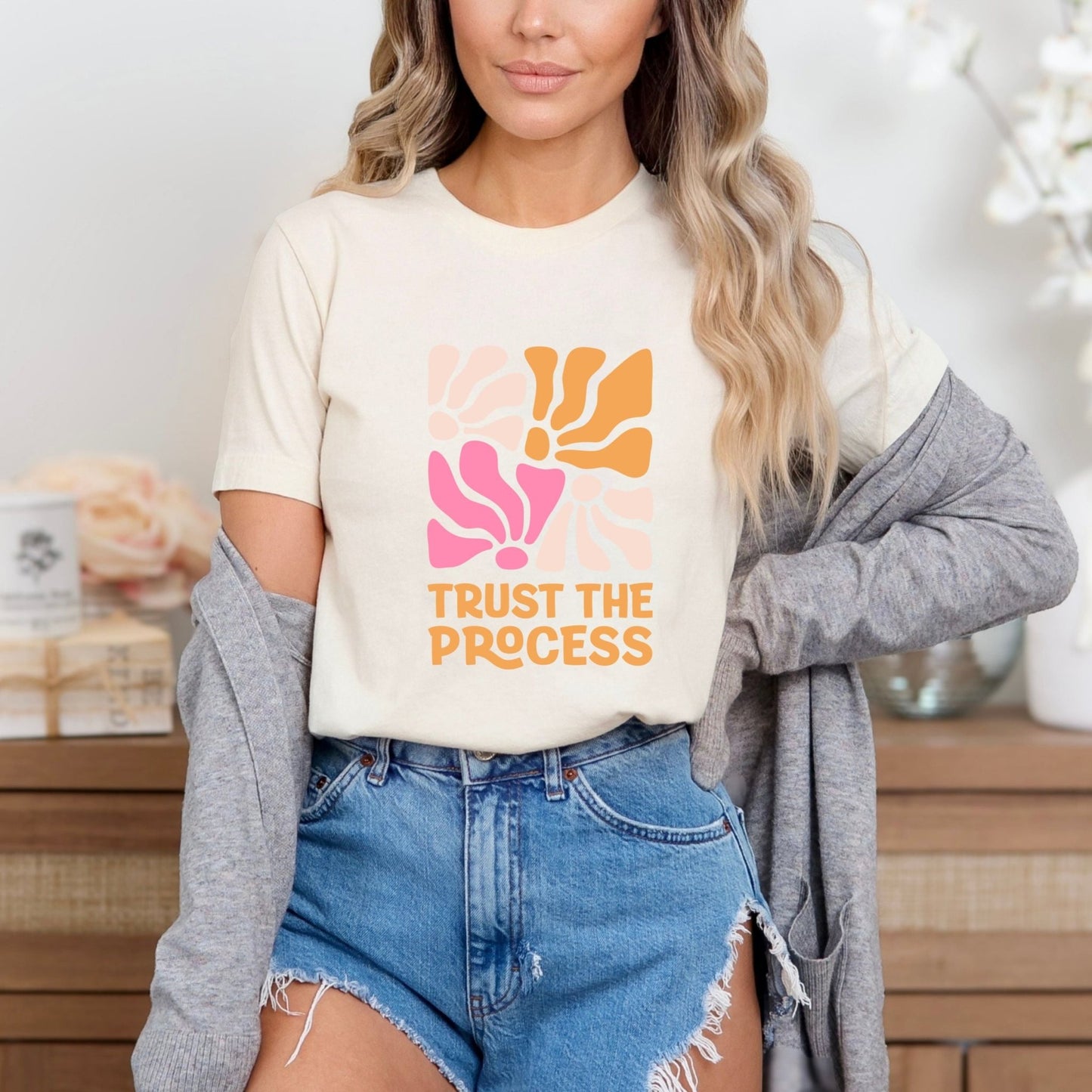 Trust the Process t-shirt with a vibrant floral abstract design in bold colors, perfect for motivation and style.