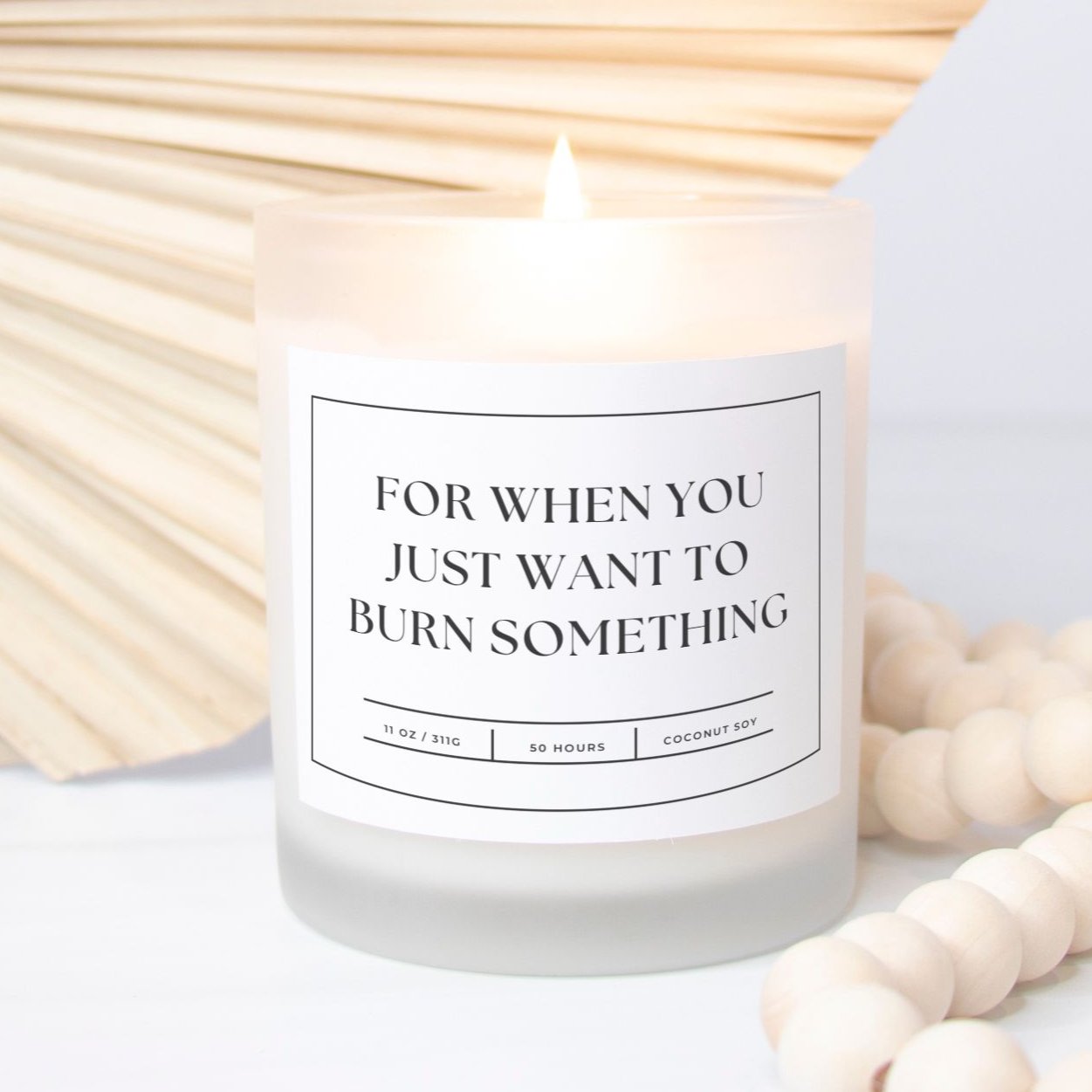 Funny stress-relief candle in frosted glass with text 'For When You Just Want to Burn Something' design.